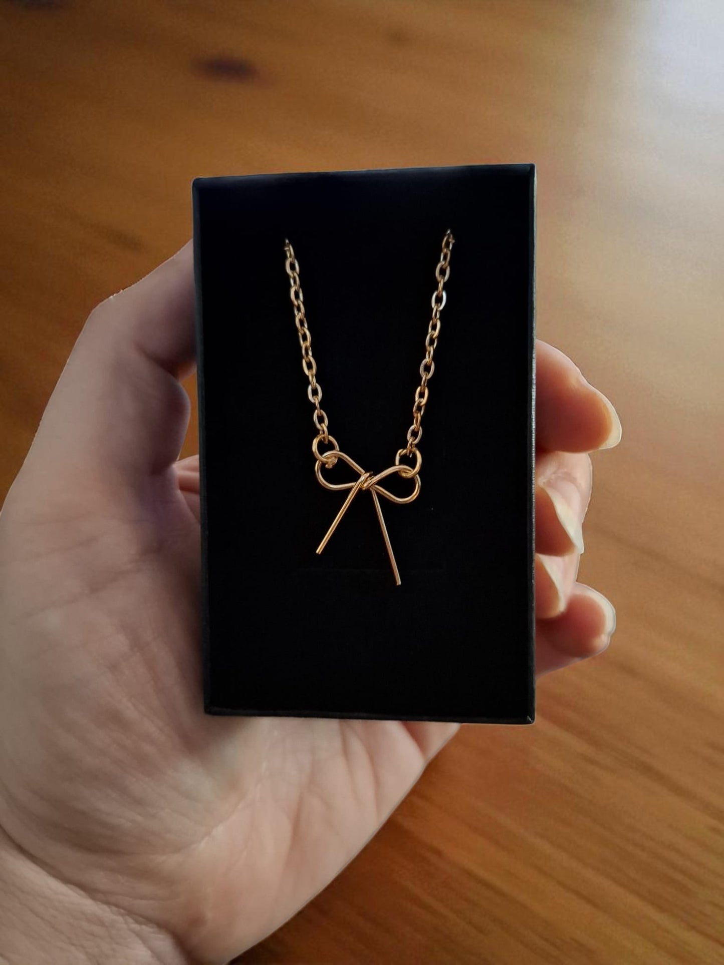 π Gouden Strikjesketting β Voor meisjes die overal een feestje van maken! π