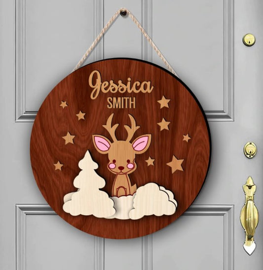 Houten deurbord met rendier en Naam