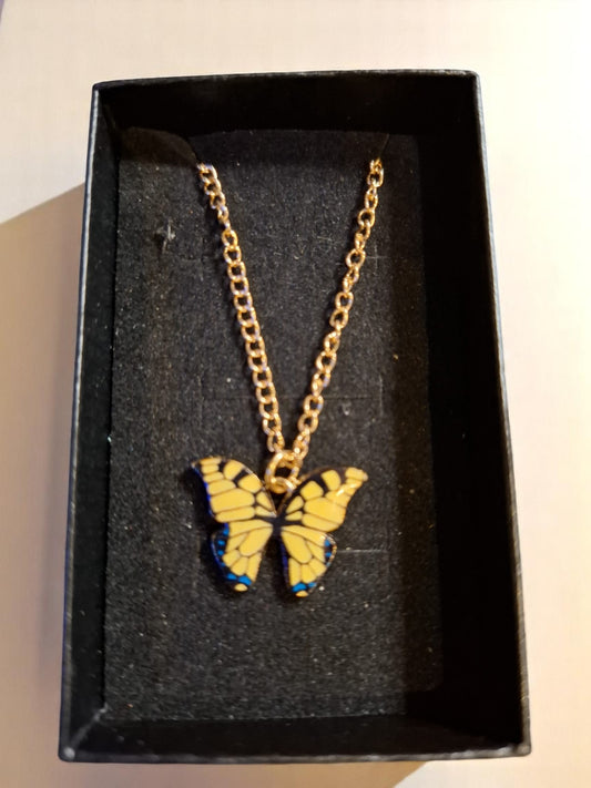 🦋 Zonnestraal Vlinderketting – Stralend geel met een vleugje blauw!