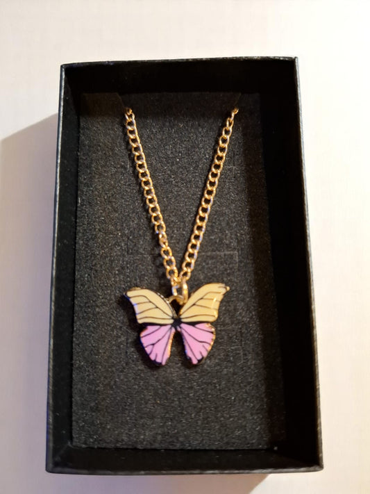🦋 Snoepjesvlinder Ketting – Roze & Geel voor kleine prinsesjes!